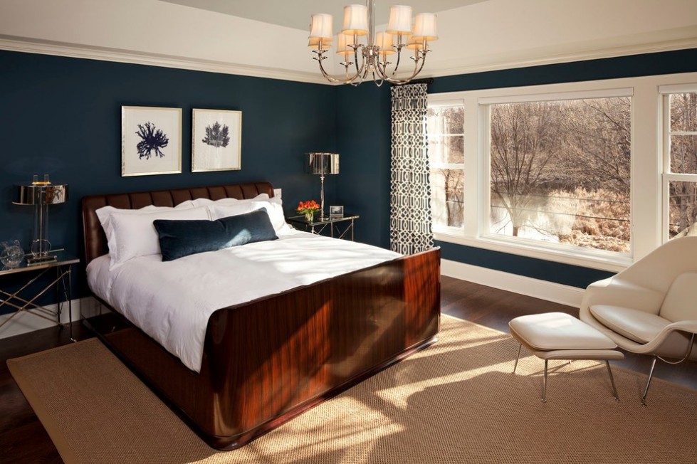 navy blue bedroom with brown furniture