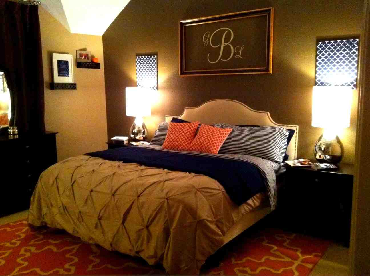 master bedroom wall decor with dark wood furniture